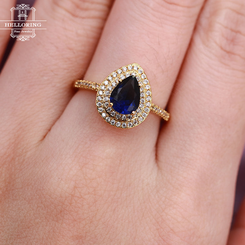 Vintage engagement ring with a pear shaped lab Sapphire and halo set diamonds or Moissanite in solid 14k gold Women Micro pave Half eternity